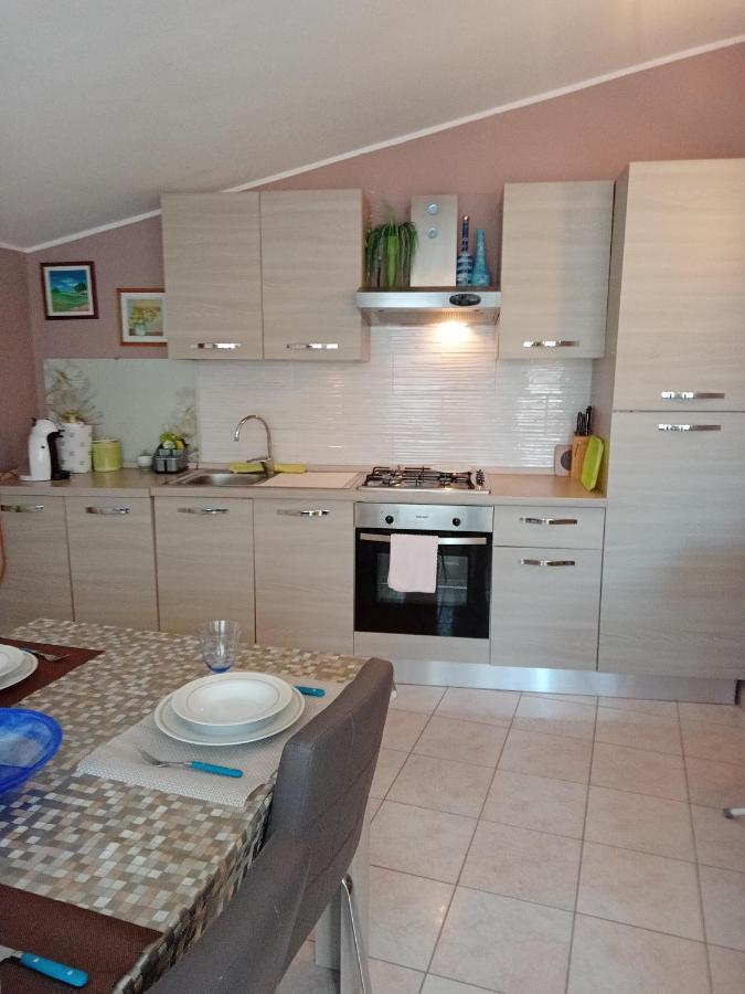 Casa Vacanza Le 2 Isole Suni Exterior photo